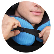 Man adjusting Airplane travel pillow Memory foam travel pillow for astronauts for comfort during travel.