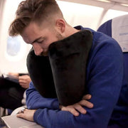Car and Airplane Pillow | Neck Pillow Travel Pillow for Comfortable used by a man sleeping on a plane.